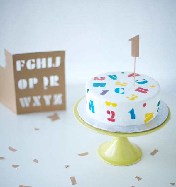 White Cake Painted with Stenciled Numbers