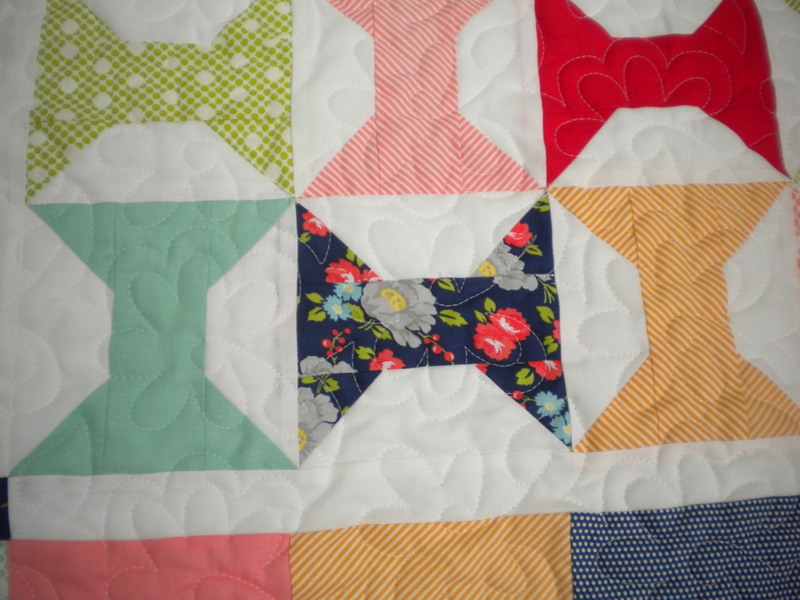 Quilt Featuring Patterned Bowtie Design