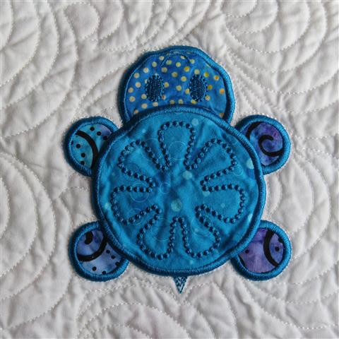 Quilt Featuring Turtle Done with Machine Embroidery