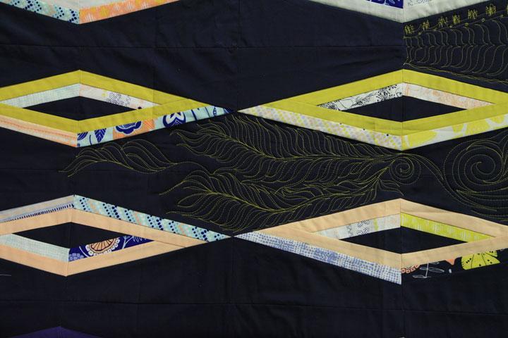 Quilt Featuring Diamonds and Longarm Design