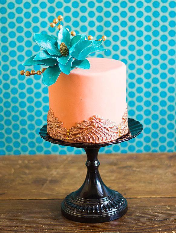 Pink Cake with Blue Fondant Flower and Lace