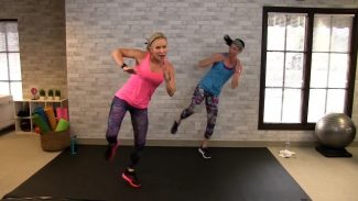 Two women doing cardio kickboxing