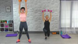 Two women working out with dumbbells