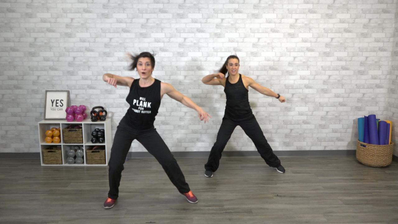 Two women doing dance cardio