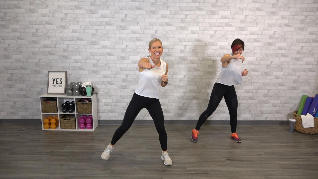 Two women doing cardio kickboxing