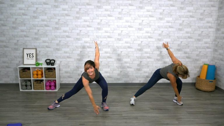 Two women doing a bodyweight workout class