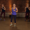 Three women doing an indoor power walking workout