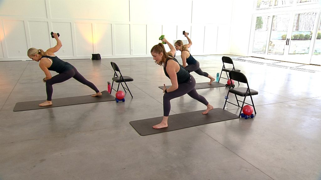Three women in lunges doing one arm dumbbell flies