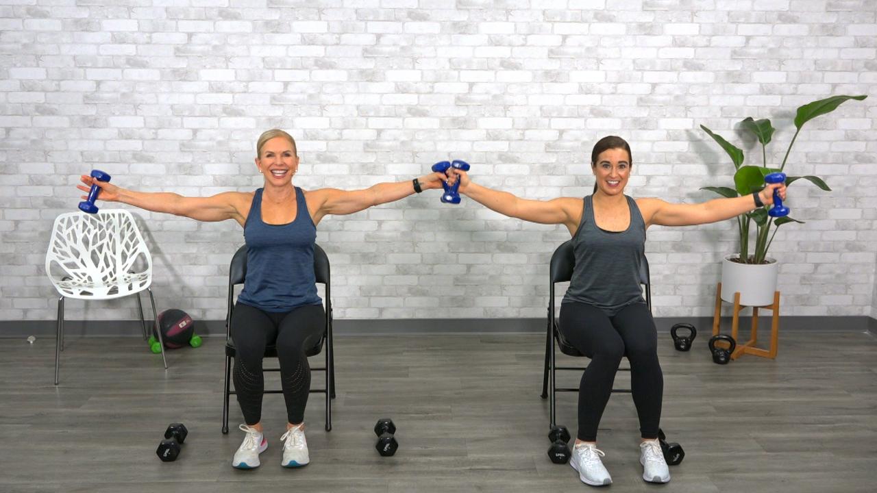 Two women doing dumbbell flies in a chair