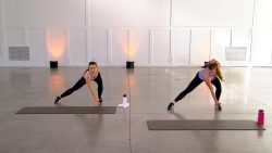 Two women working out in a large space