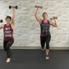 Two women working out with lunges
