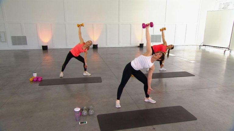 Three women doing a workout with dumbbells