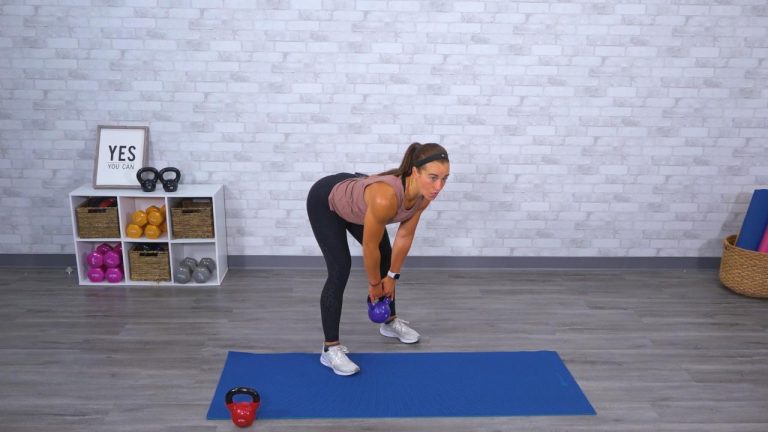 Woman exercising with a kettlebell