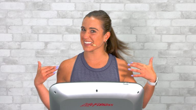 Woman talking on a treadmill