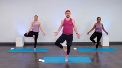 Three people doing yoga