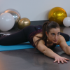 Woman doing a stretch on the floor