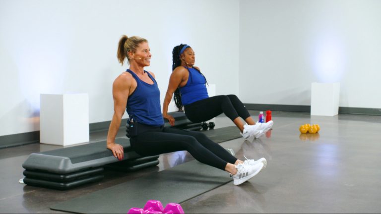 Women doing tricep dips on a step