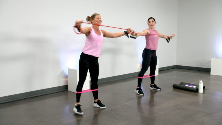 Two women working out with resistance bands and mini bands