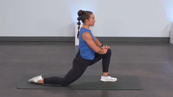 Woman doing a post-workout stretch
