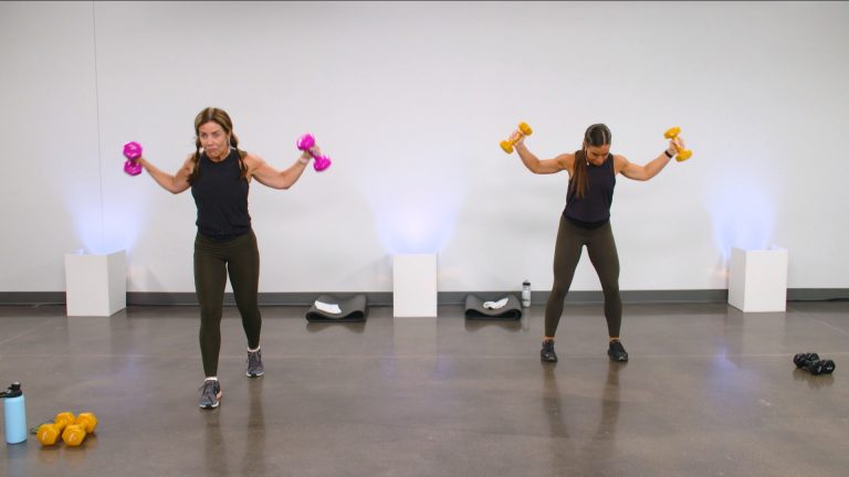 Two women doing reverse flies with dumbbells