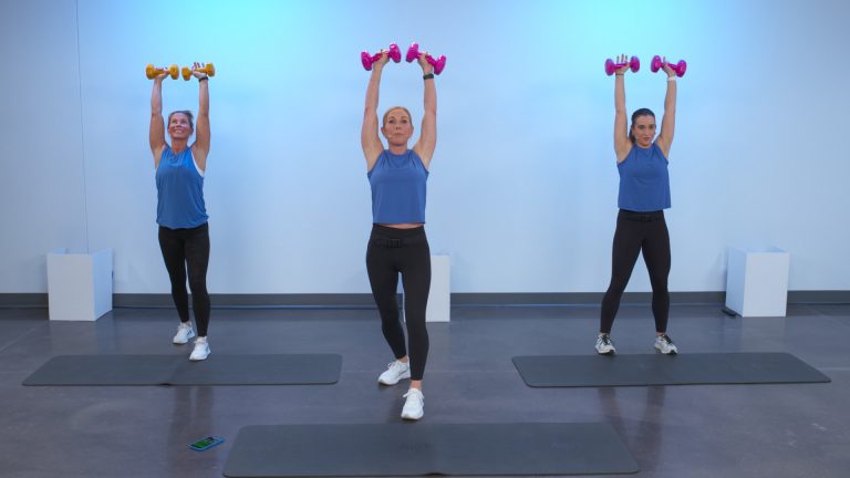 Three women doing an arm workout with dumbbells