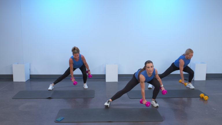Three women doing lateral lunges