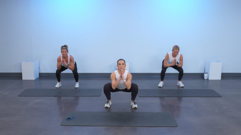 Three women doing squats