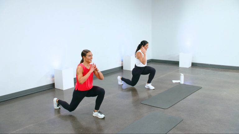 Two women doing lunges