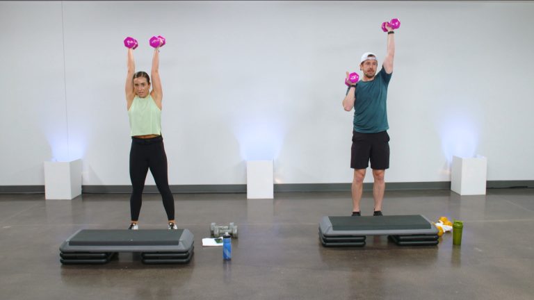 A woman and a man working out with dumbbells