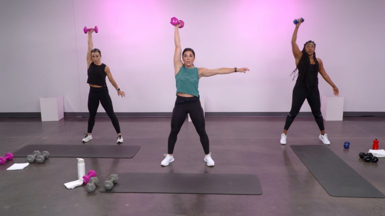 Three women doing an arm workout