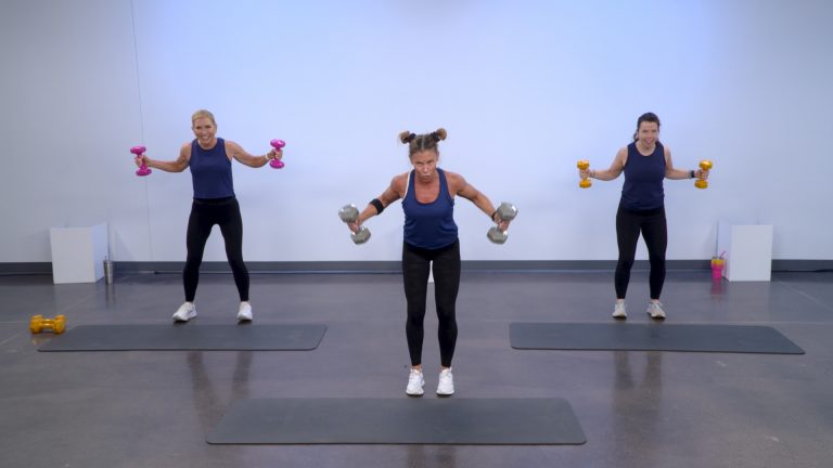 Three women working out with dumbbells