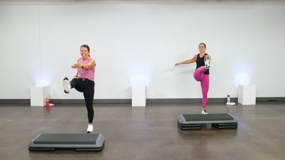 Women doing a cardio step class