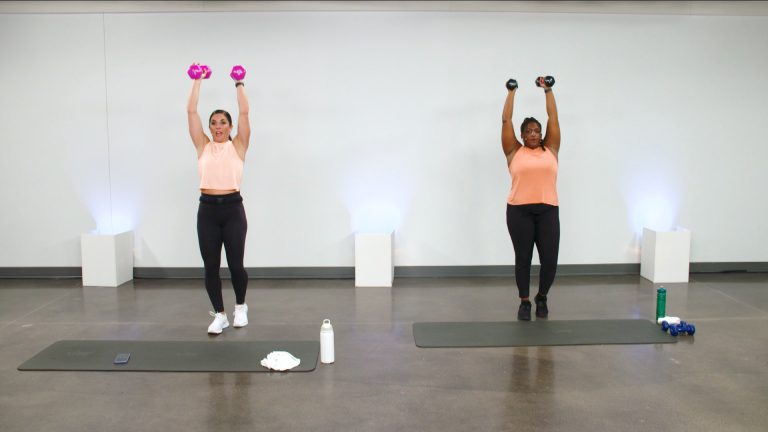 Two women doing narrow overhead presses with dumbbells