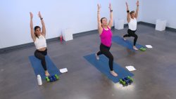 Three women doing yoga