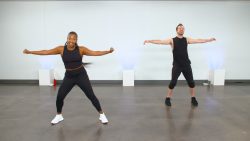 A man and a woman doing a dance groove class