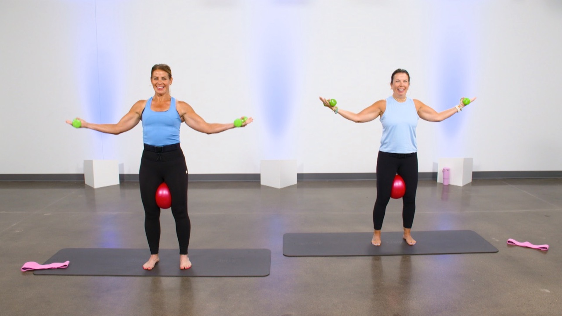Two women doing barre HIIT cardio
