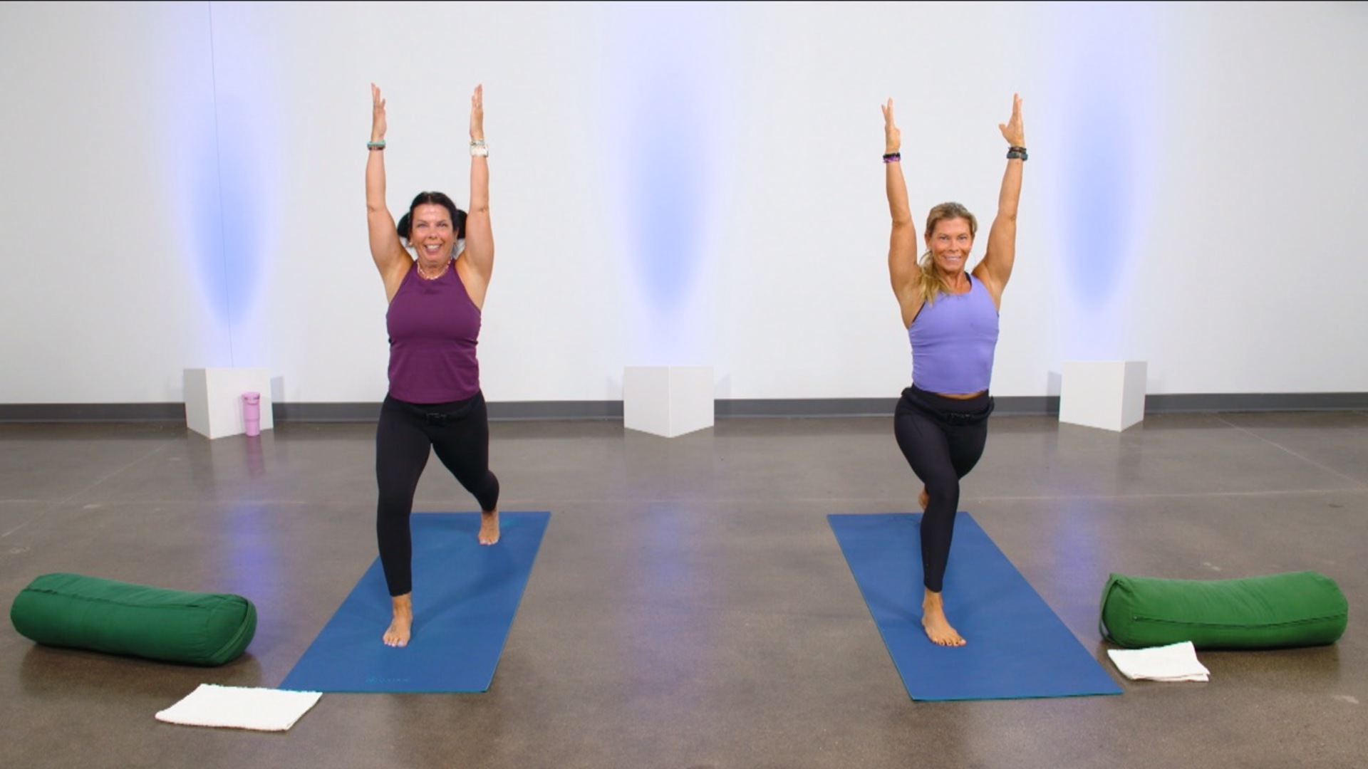 Two women doing yoga