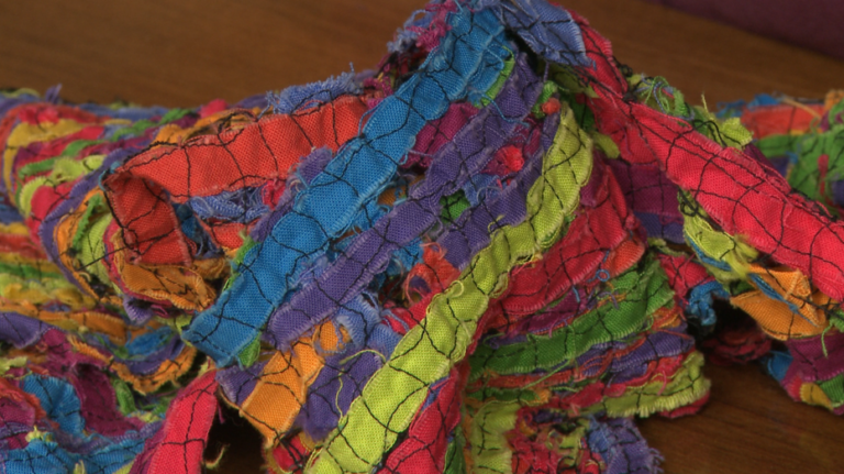 Make a Scrappy Scarf With Stitched Fabric Scrapsproduct featured image thumbnail.
