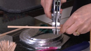 Carving the Birdcage Cake