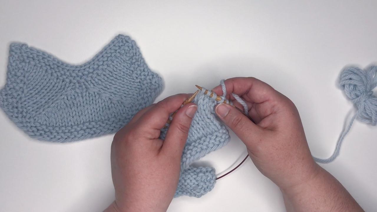 Working double decreases with knit stitches