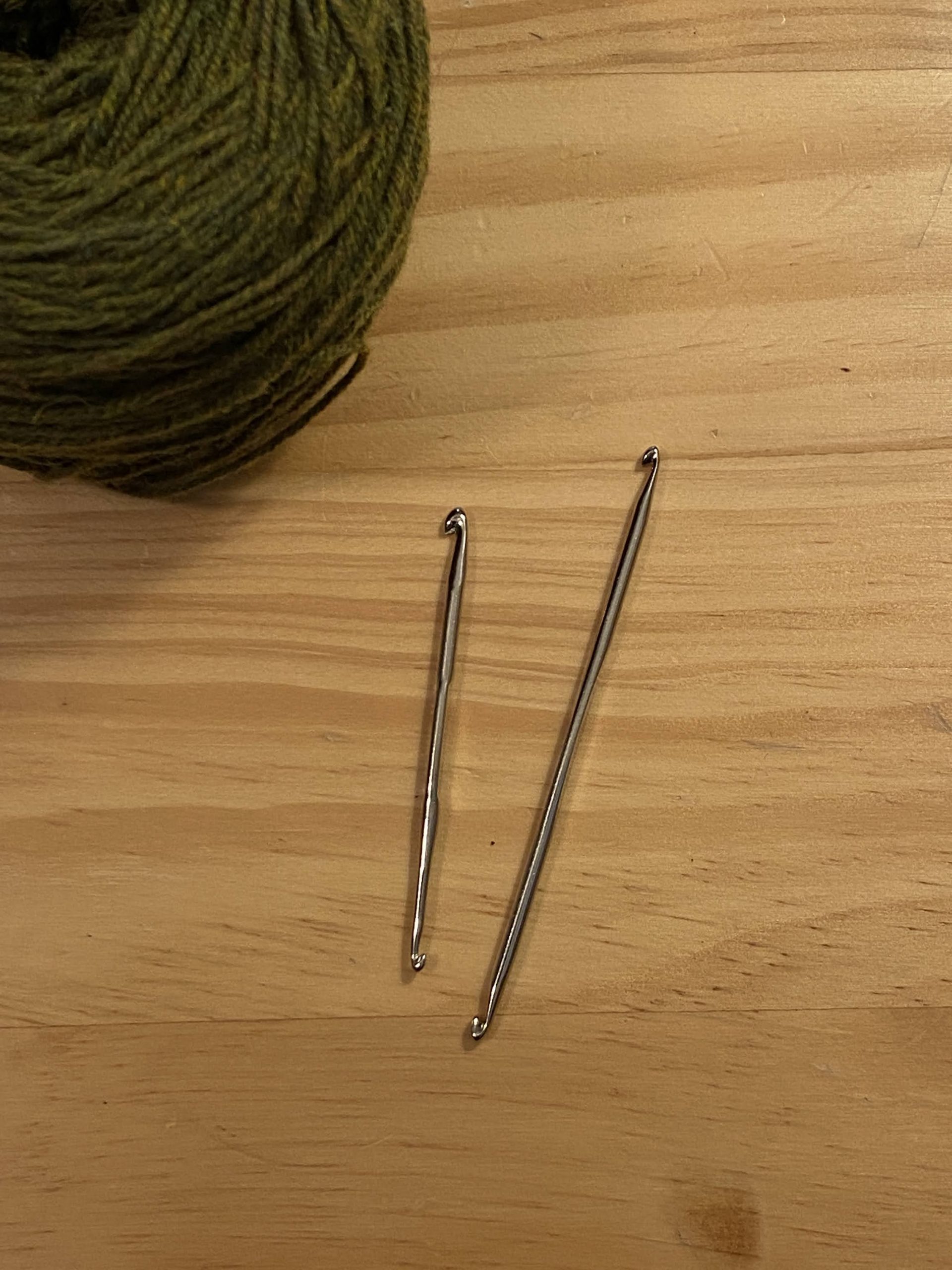 Pro Tip: Put some of your stitch markers on your yarn scissors : r