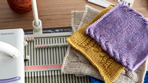 Pile of machine knitted squares