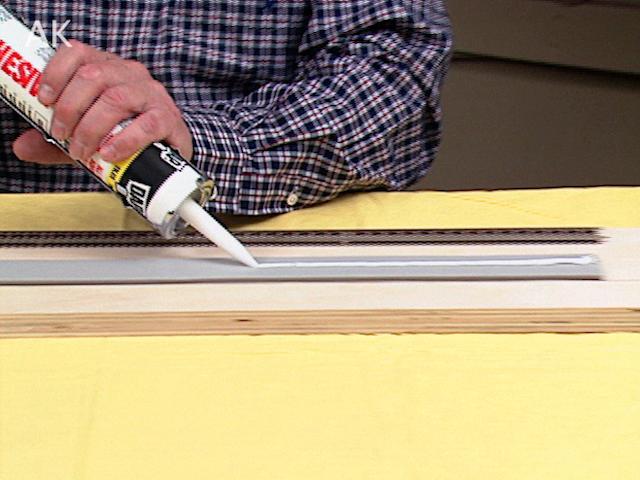Tracklaying Without Nails: Adhesive Caulk and Topper Tapeproduct featured image thumbnail.