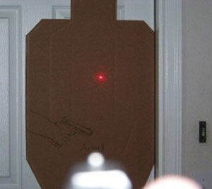demonstration of laser used in dark on target