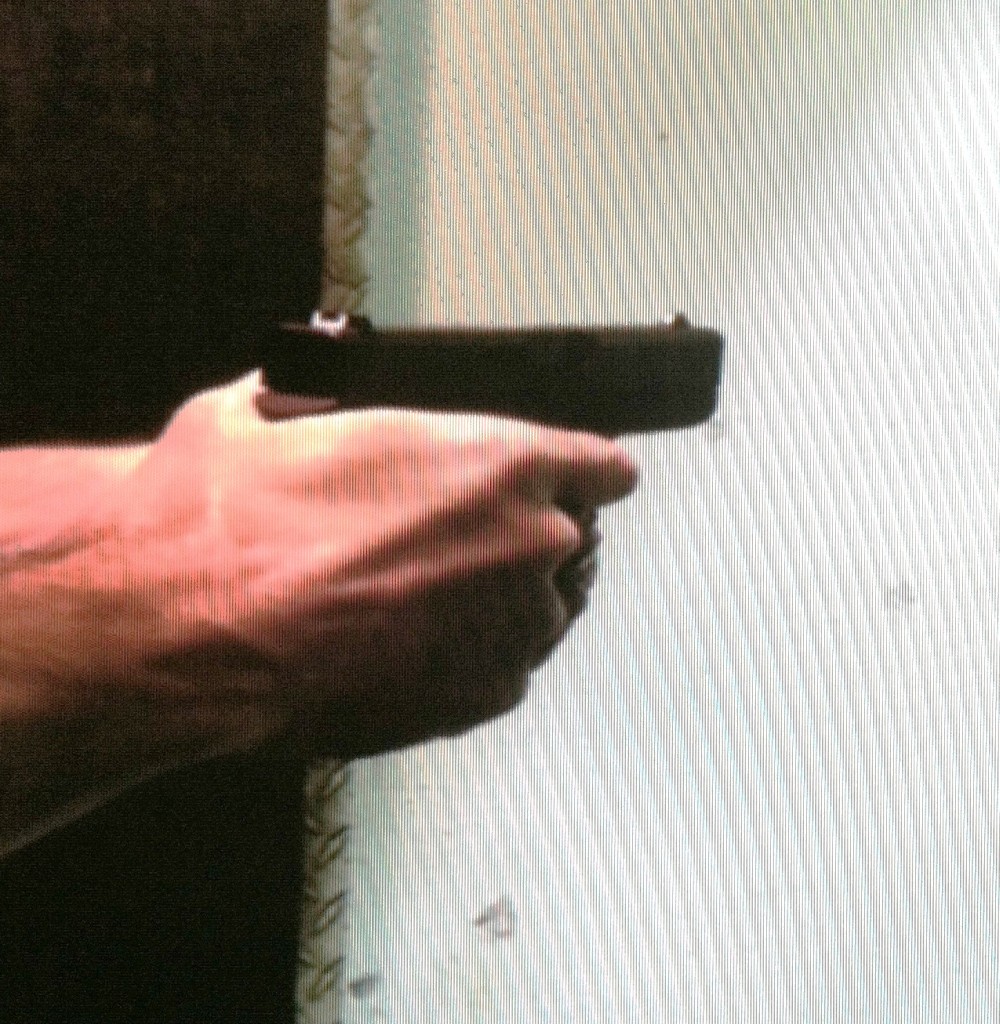 Stills taken from video show Glock 42 firing, at full recoil, and recovering. This is one of the mildest .380 pistols author has ever fired. Courtesy author