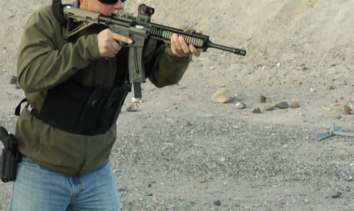 Man aiming a .22 caliber