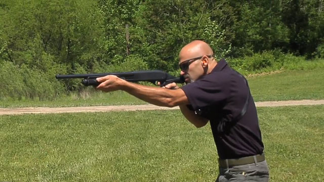 Man aiming an AR 15