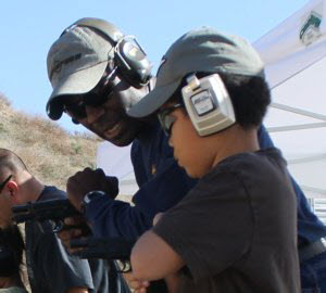 Shooters of all ages can benefit from learning how to use gross motor skills to manipulate a firearm.