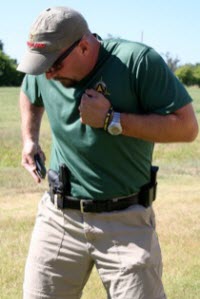 Holster method of securing the firearm is great if holster stays open after the draw process and is accessible underneath concealment. Here the holster is easy to access because author is not covering the gun with a shirt.