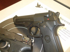 Ruger P95 and Beretta 92FS with slide-mounted decocking safeties.